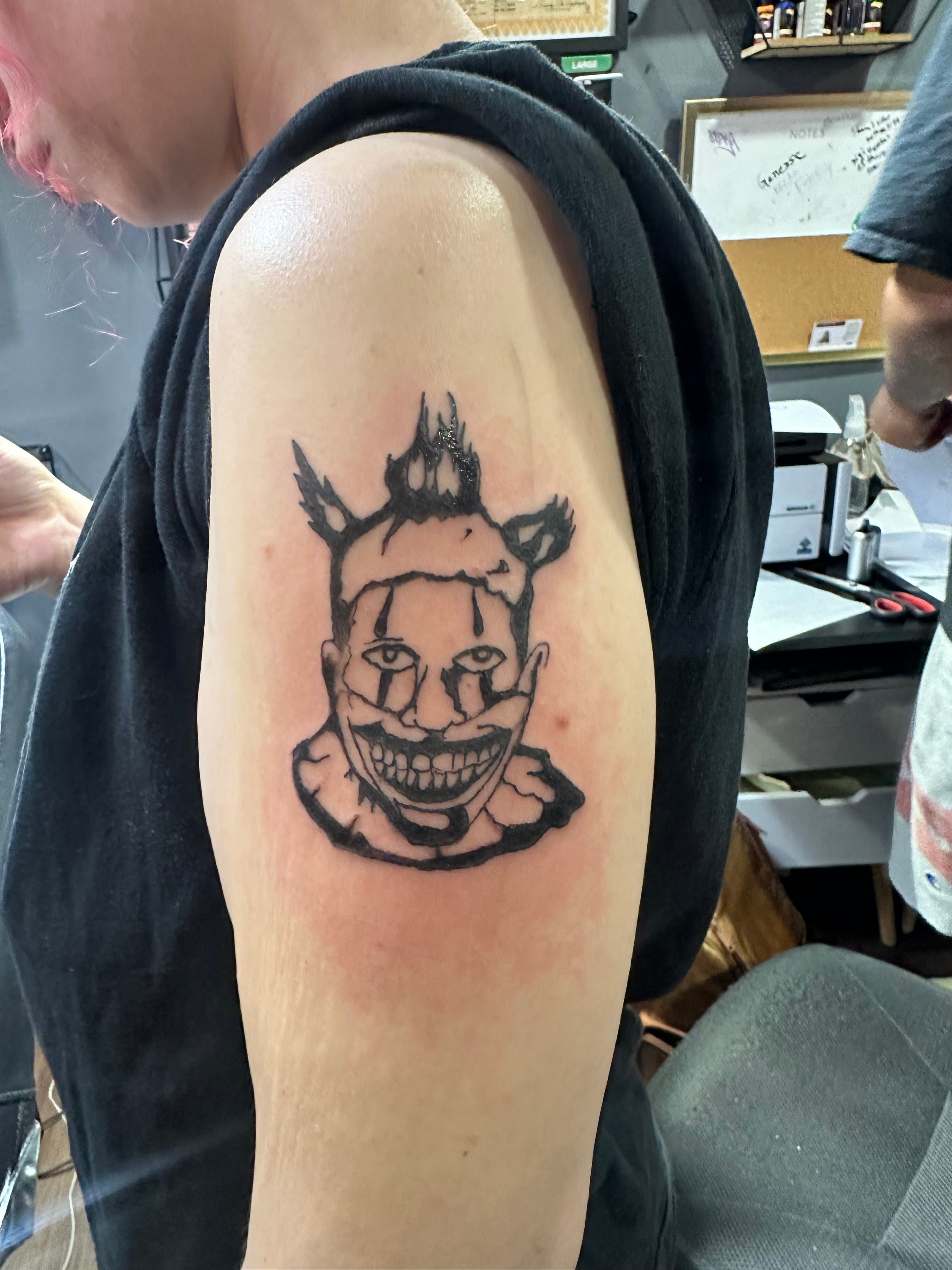 Scary looking clown being all scary and such